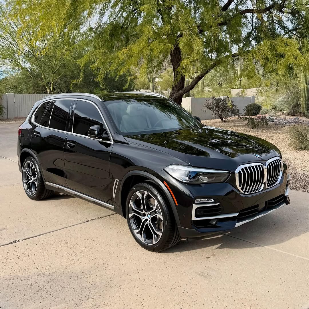 Dark BMW X5 SUV washed and sealed during a mobile detailing appointment in the Pioneer Valley