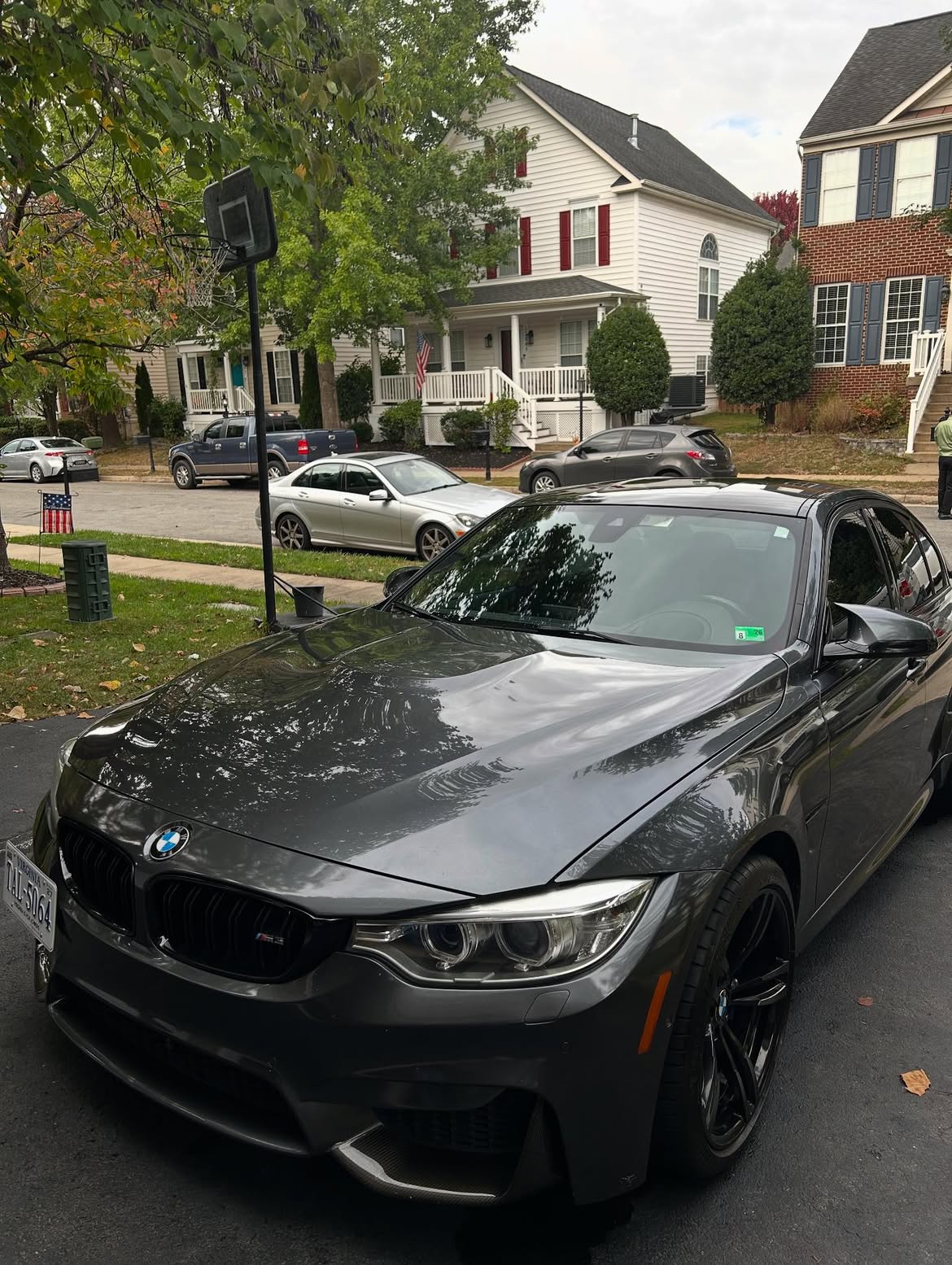 Dark grey BMW M3 with glossy paint after an exterior wash, clay, and seal detail in Belchertown, MA